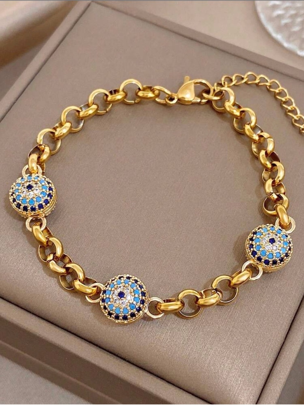 Gold-Tone Bracelet with Blue and White Pave Discs